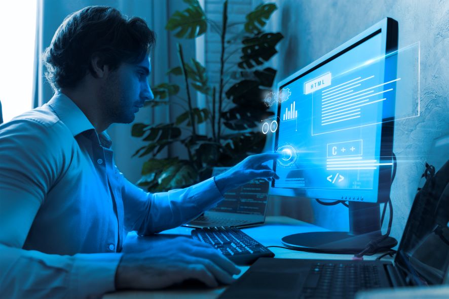 Professional working with digital web application screen