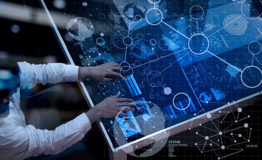 large digital touchscreen displaying data analytics, charts, and network connections.